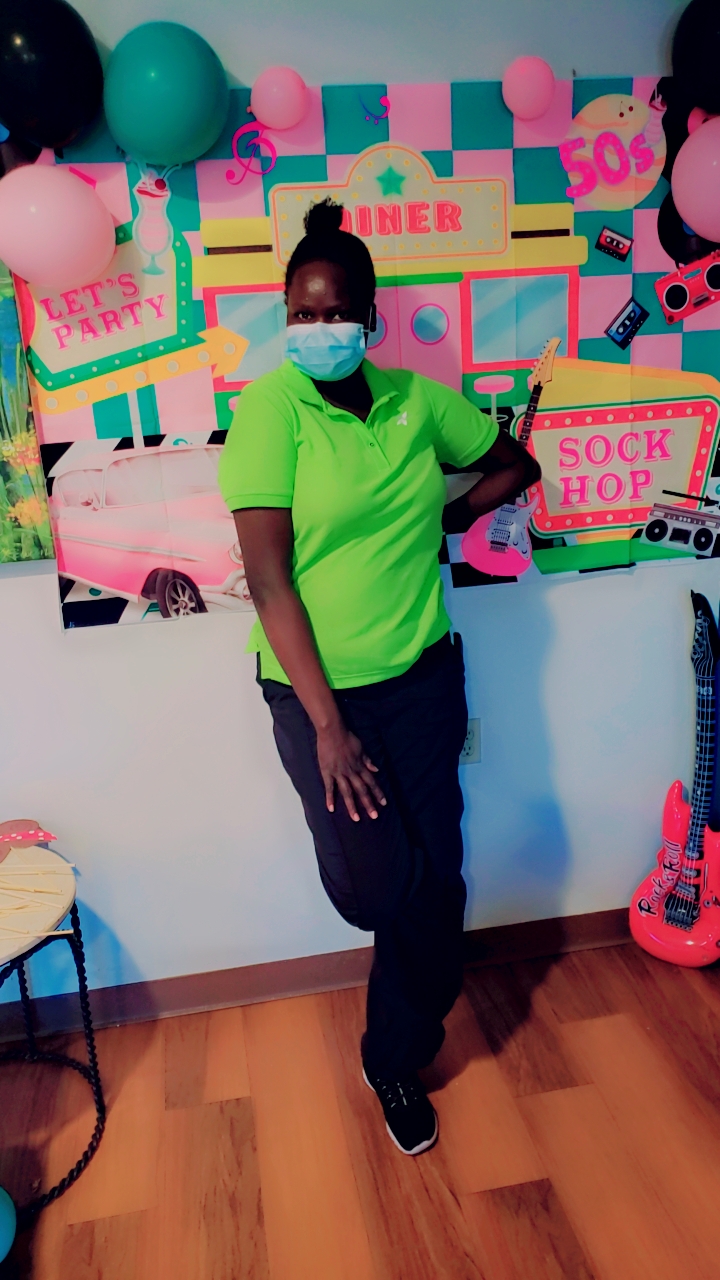 A Selena M Barach caregiver at a 50's Sock Hop themed community event.